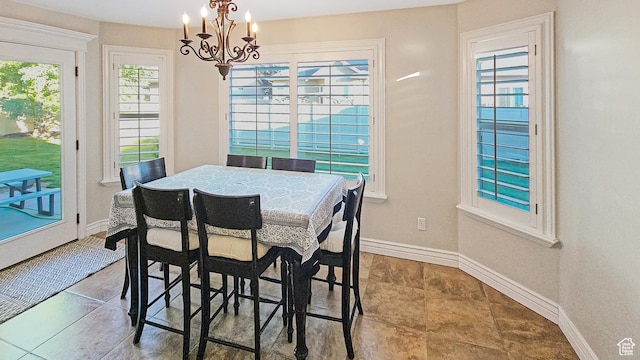 1812 E 1460 S, Spanish Fork, UT 84660 - dining space featuring a chandelier and dark tile patterned floors
