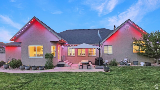 1812 E 1460 S, Spanish Fork, UT 84660 - back of property featuring stucco siding, a lawn, and a patio area