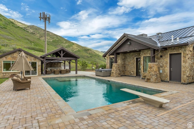 370 S Got Teeth Ln E, Emigration Canyon, UT 84108 - swimming pool featuring an outdoor hangout area, a mountain view, a gazebo, a hot tub, and a patio area