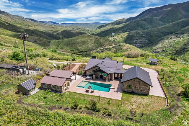 370 S Got Teeth Ln E, Emigration Canyon, UT 84108 - view of subject property with a mountainous background and a pool area