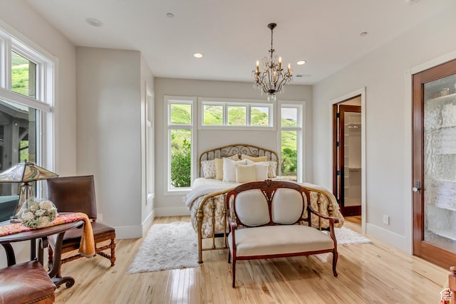 370 S Got Teeth Ln E, Emigration Canyon, UT 84108 - bedroom featuring multiple windows, a chandelier, light wood-style flooring, and recessed lighting