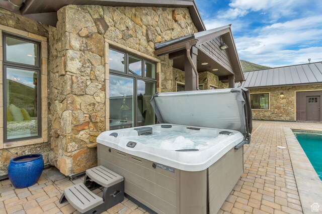 370 S Got Teeth Ln E, Emigration Canyon, UT 84108 - view of patio / terrace featuring a hot tub and a pool