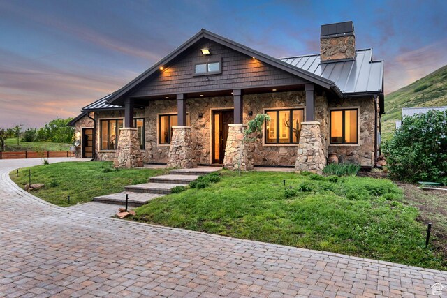 370 S Got Teeth Ln E, Emigration Canyon, UT 84108 - craftsman inspired home with a standing seam roof, a chimney, stone siding, a yard, and a metal roof