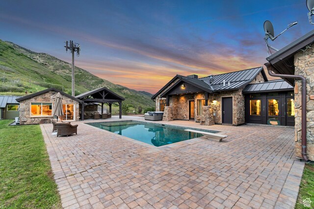370 S Got Teeth Ln E, Emigration Canyon, UT 84108 - outdoor pool featuring a patio, a mountain view, a gazebo, an outdoor living space, and an outbuilding