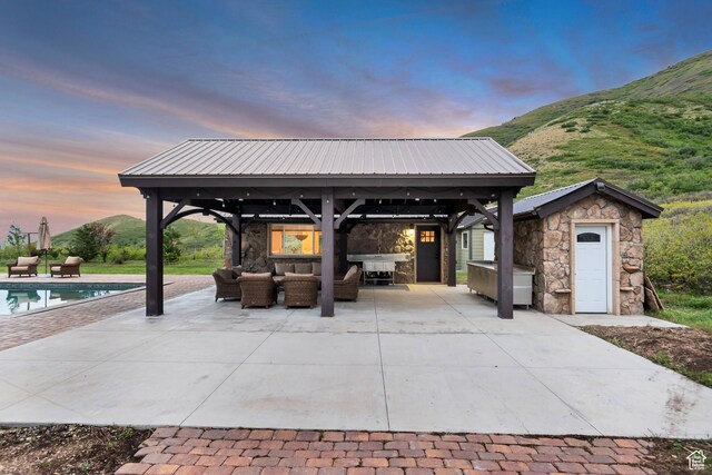 370 S Got Teeth Ln E, Emigration Canyon, UT 84108 - view of patio / terrace featuring a gazebo, an outdoor hangout area, an outdoor pool, and a mountain view