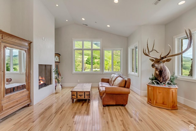 370 S Got Teeth Ln E, Emigration Canyon, UT 84108 - sitting room with light wood-type flooring, a lit fireplace, recessed lighting, and high vaulted ceiling