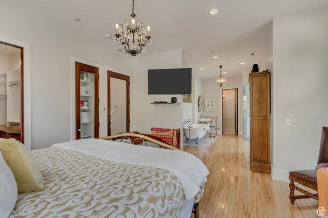 370 S Got Teeth Ln E, Emigration Canyon, UT 84108 - bedroom featuring a chandelier, light wood-type flooring, and recessed lighting