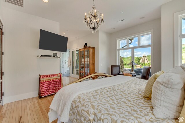 370 S Got Teeth Ln E, Emigration Canyon, UT 84108 - bedroom featuring light wood-style flooring, a chandelier, and recessed lighting