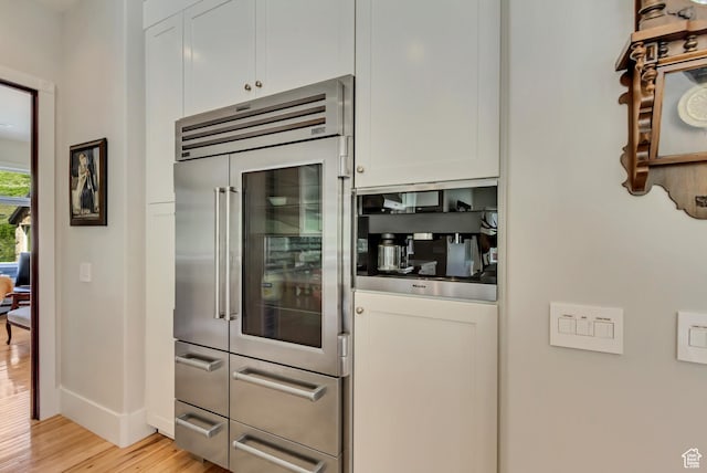 370 S Got Teeth Ln E, Emigration Canyon, UT 84108 - bar area featuring stainless steel built in fridge and light wood-style floors