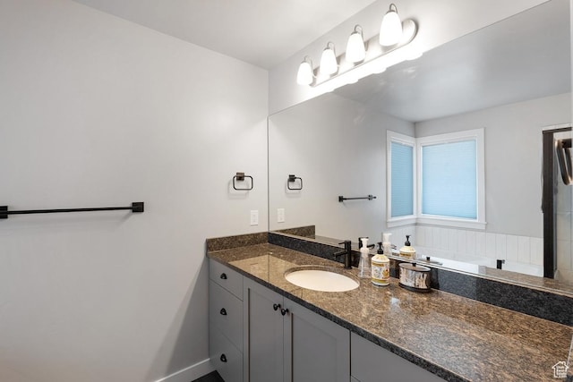1308 E Daffodil Ct Unit 150, Layton, UT 84040 - bathroom featuring vanity and baseboards