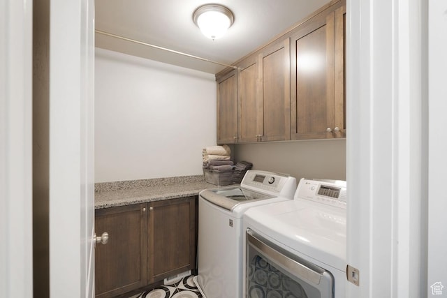 1308 E Daffodil Ct Unit 150, Layton, UT 84040 - washroom featuring cabinet space and separate washer and dryer