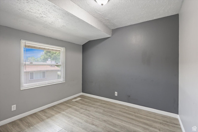 55 W San Rafael Ct S, West Jordan, UT 84088 - empty room featuring a textured ceiling and light wood-type flooring