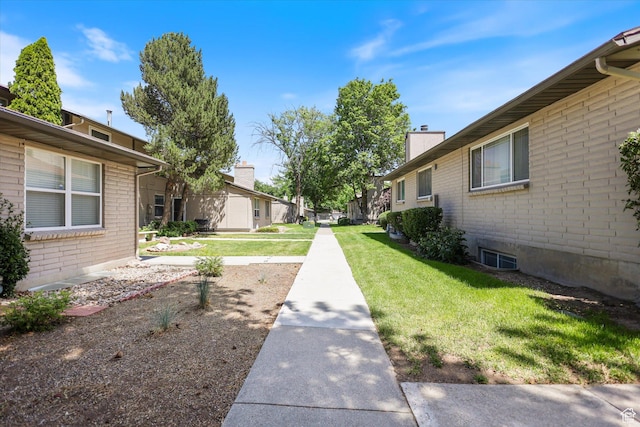 55 W San Rafael Ct S, West Jordan, UT 84088 - surrounding community featuring a yard and a residential view