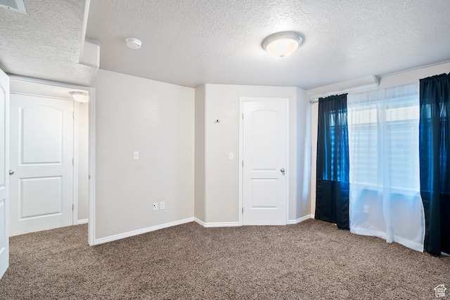 490 E 700 S Unit 524, Clearfield, UT 84015 - unfurnished bedroom featuring a textured ceiling and carpet floors