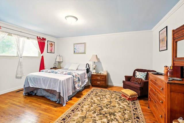 1188 N 600 E, Logan, UT 84341 - bedroom with wood finished floors and crown molding