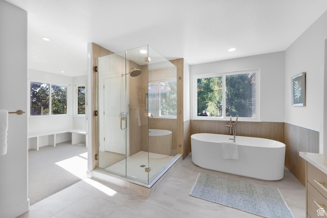 2795 E Palma Way, Cottonwood Heights, UT 84121 - full bath with a soaking tub, a shower stall, wainscoting, recessed lighting, and tile patterned floors