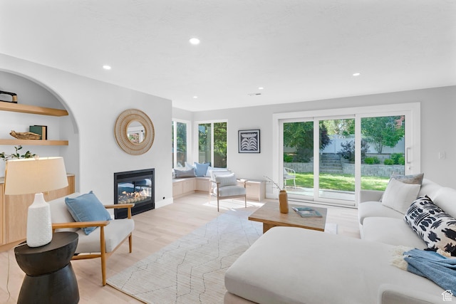 2795 E Palma Way, Cottonwood Heights, UT 84121 - living room featuring light wood finished floors, recessed lighting, and a glass covered fireplace