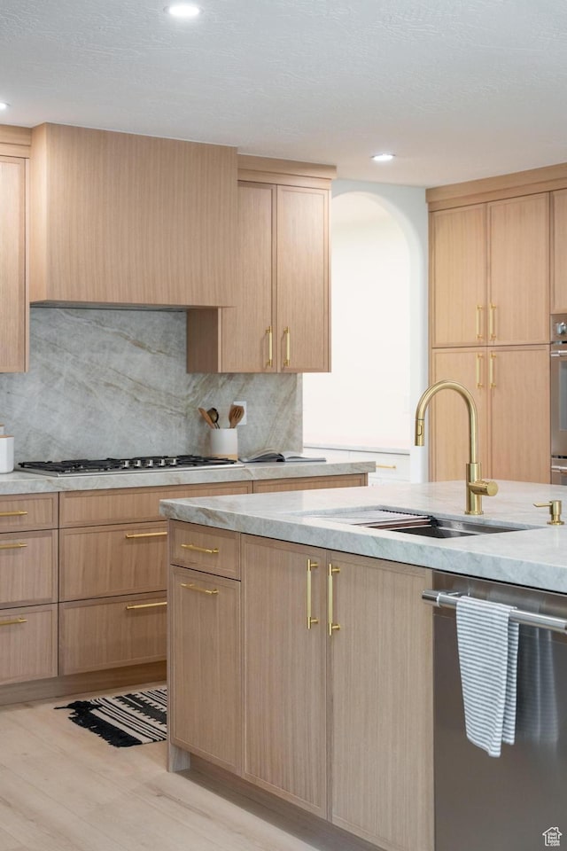2795 E Palma Way, Cottonwood Heights, UT 84121 - kitchen with stainless steel appliances, light brown cabinets, decorative backsplash, and recessed lighting