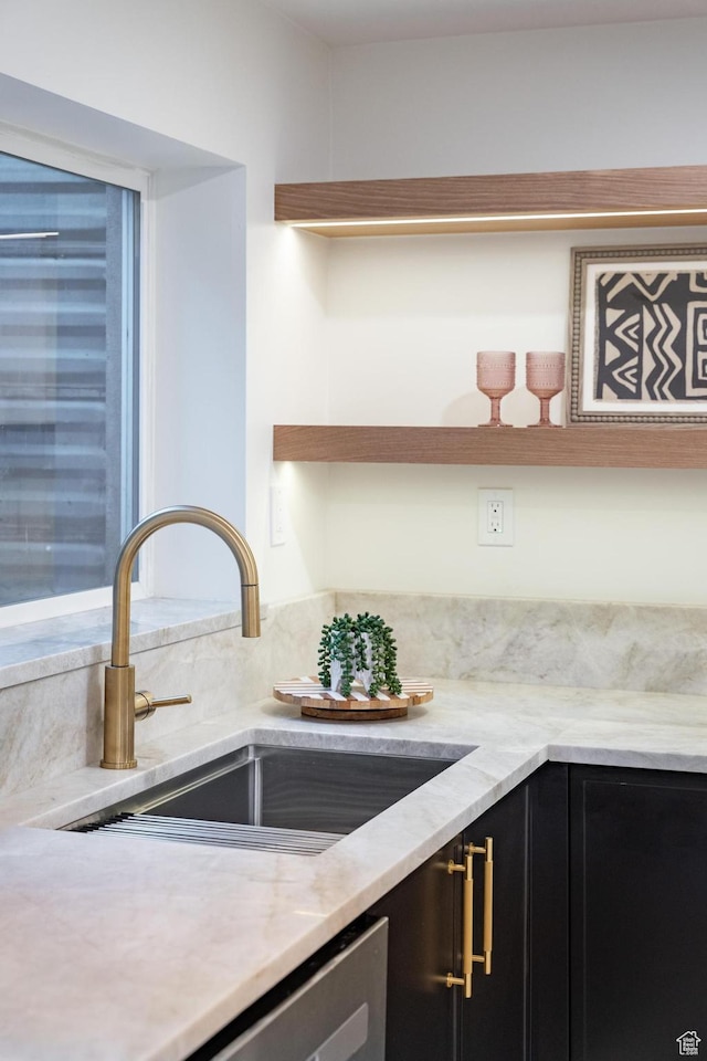 2795 E Palma Way, Cottonwood Heights, UT 84121 - kitchen with dark cabinetry, light stone countertops, open shelves, and stainless steel dishwasher
