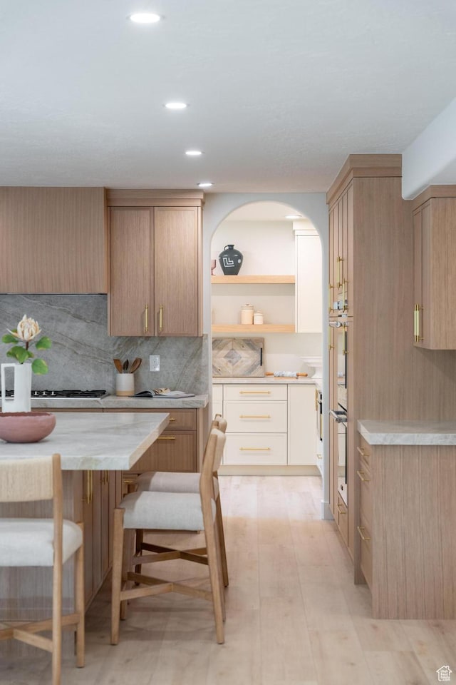 2795 E Palma Way, Cottonwood Heights, UT 84121 - kitchen with light countertops, open shelves, stainless steel gas stovetop, double wall oven, and recessed lighting