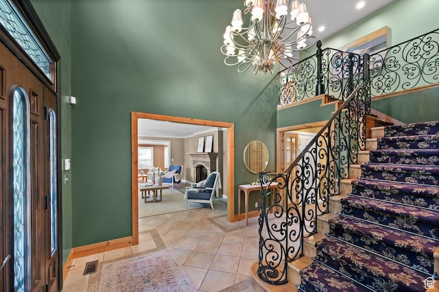 5757 S Holladay Blvd E, Holladay, UT 84121 - entrance foyer featuring a towering ceiling, stairs, recessed lighting, a chandelier, and light tile patterned flooring