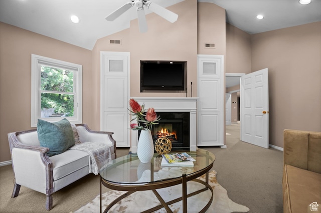 5757 S Holladay Blvd E, Holladay, UT 84121 - living area featuring carpet floors, lofted ceiling, ceiling fan, a lit fireplace, and recessed lighting