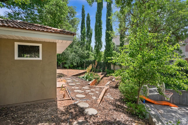 5757 S Holladay Blvd E, Holladay, UT 84121 - view of yard featuring a vegetable garden