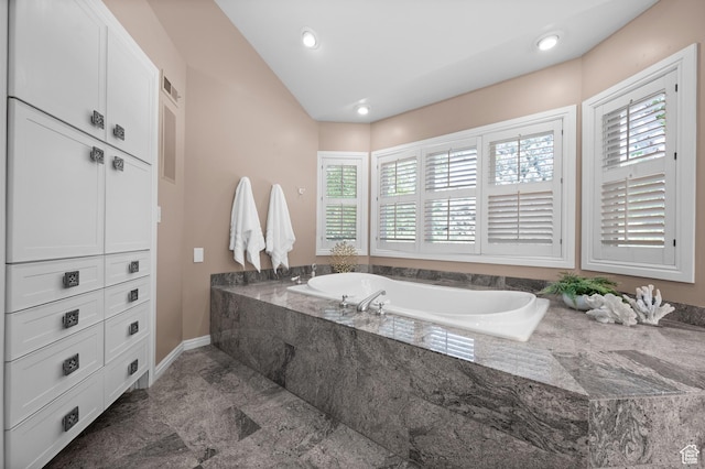 5757 S Holladay Blvd E, Holladay, UT 84121 - full bath featuring a bath, vaulted ceiling, and recessed lighting