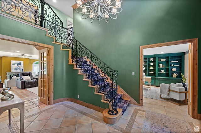 5757 S Holladay Blvd E, Holladay, UT 84121 - stairs with a high ceiling, a chandelier, a ceiling fan, and recessed lighting