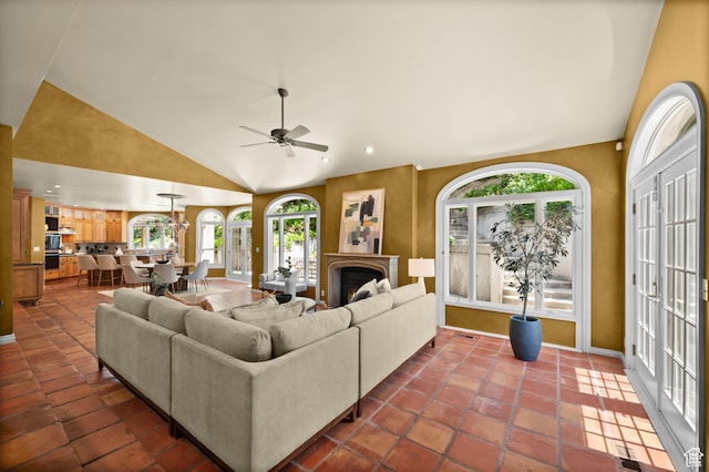 5757 S Holladay Blvd E, Holladay, UT 84121 - living area featuring healthy amount of natural light, ceiling fan, high vaulted ceiling, recessed lighting, and a warm lit fireplace