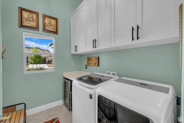 3075 E Delany Dr, St George, UT 84790 - washroom with cabinet space, washing machine and dryer, and light tile patterned floors