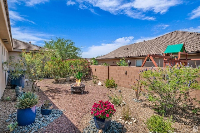 3075 E Delany Dr, St George, UT 84790 - fenced backyard with a fire pit