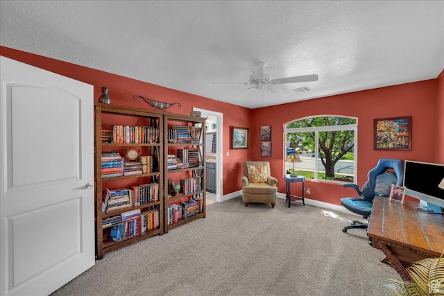 3075 E Delany Dr, St George, UT 84790 - carpeted home office with a ceiling fan and a textured ceiling