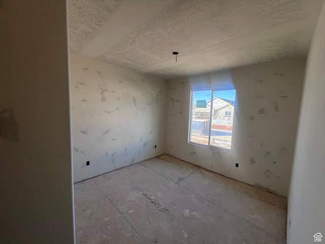2352 E Blossom St, Eagle Mountain, UT 84005 - unfurnished room featuring a textured ceiling