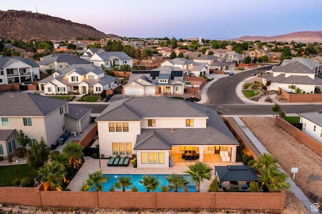 2530 S Monterosa Ln, St George, UT 84790 - aerial view of residential area featuring a mountain backdrop