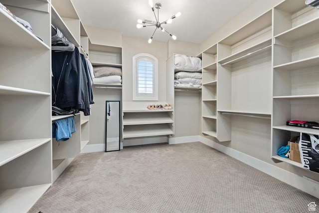 2530 S Monterosa Ln, St George, UT 84790 - spacious closet featuring carpet and a chandelier