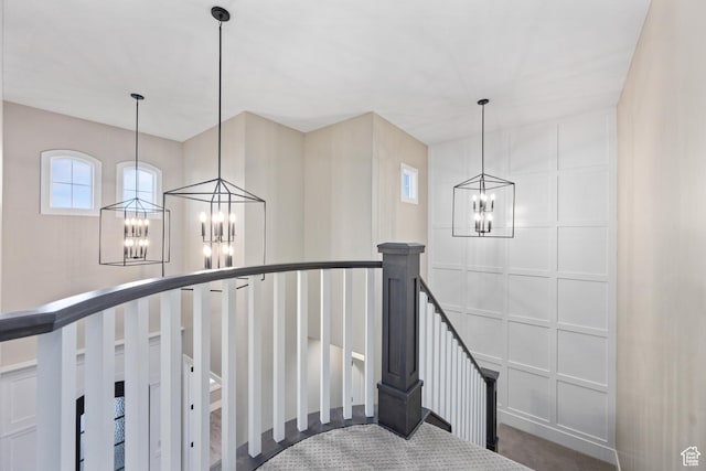 2530 S Monterosa Ln, St George, UT 84790 - staircase featuring a chandelier and carpet flooring