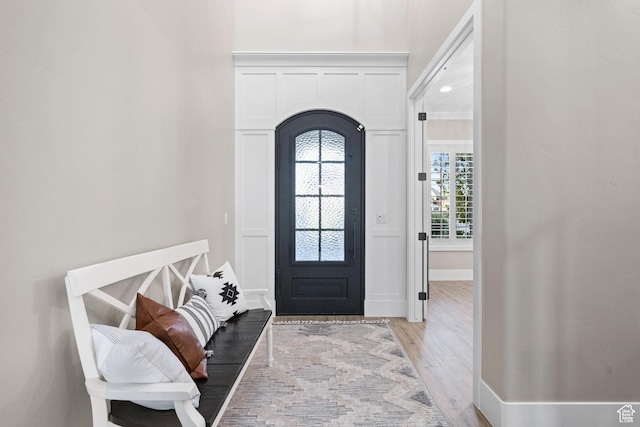 2530 S Monterosa Ln, St George, UT 84790 - entrance foyer featuring arched walkways and light wood-style flooring