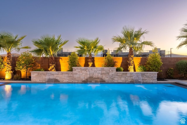 2530 S Monterosa Ln, St George, UT 84790 - pool at dusk with a fenced backyard