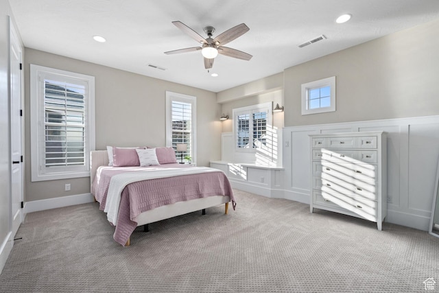 2530 S Monterosa Ln, St George, UT 84790 - bedroom with light colored carpet, a ceiling fan, and recessed lighting