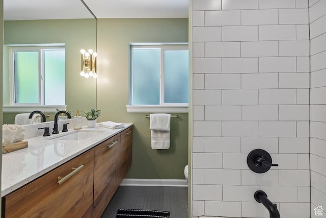 1876 E Northwoodside Dr S, Holladay, UT 84124 - bathroom featuring vanity, tile patterned flooring, and a shower