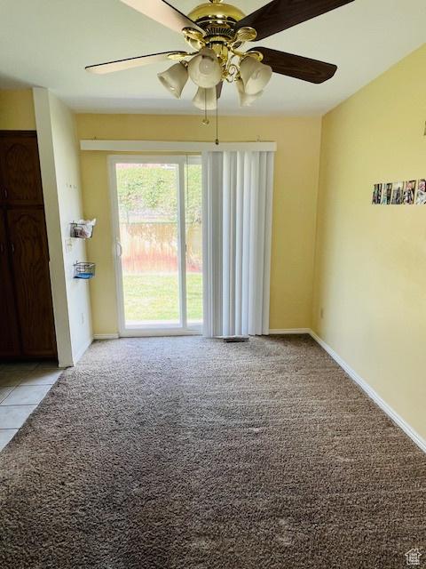 2908 N Cherry Dr E, North Ogden, UT 84414 - unfurnished room with light colored carpet and ceiling fan