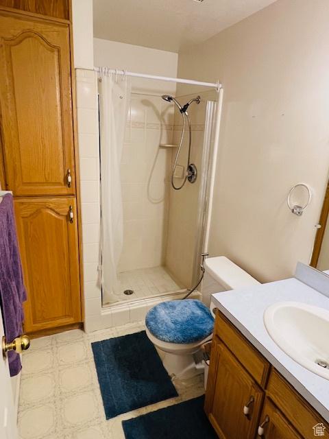 2908 N Cherry Dr E, North Ogden, UT 84414 - bathroom featuring a shower stall and vanity