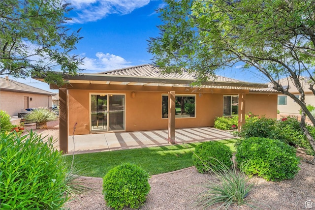 336 W 270 S, Ivins, UT 84738 - rear view of property featuring stucco siding, a tile roof, and a patio area