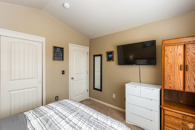 1150 N Wiltshire Dr W, North Salt Lake, UT 84054 - bedroom featuring vaulted ceiling and light carpet