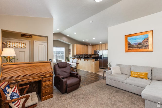 1150 N Wiltshire Dr W, North Salt Lake, UT 84054 - living area featuring vaulted ceiling, recessed lighting, light wood finished floors, and light colored carpet