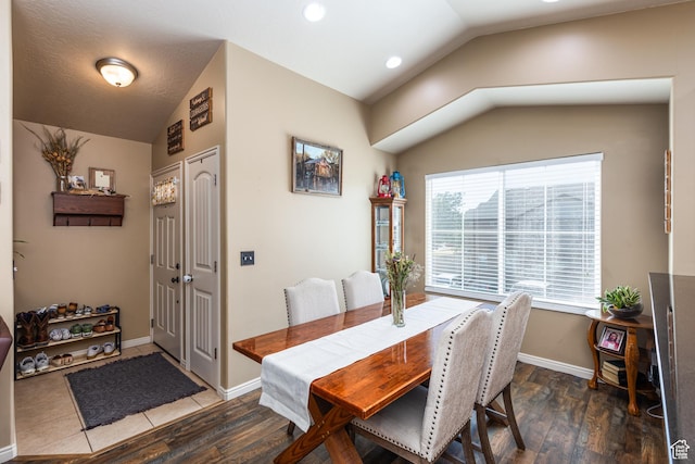 1150 N Wiltshire Dr W, North Salt Lake, UT 84054 - dining space featuring vaulted ceiling and wood finished floors