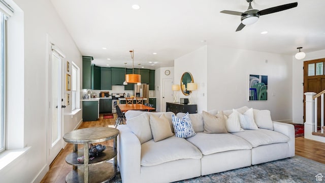312 N 240 E, Vineyard, UT 84059 - living room with wood finished floors, recessed lighting, a ceiling fan, and stairs