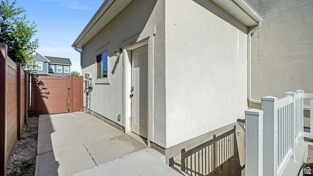 312 N 240 E, Vineyard, UT 84059 - view of side of property featuring a gate and stucco siding