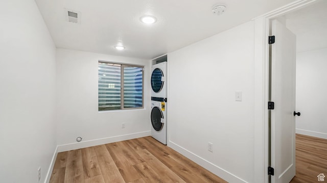 312 N 240 E, Vineyard, UT 84059 - washroom featuring stacked washer / drying machine and light wood-type flooring